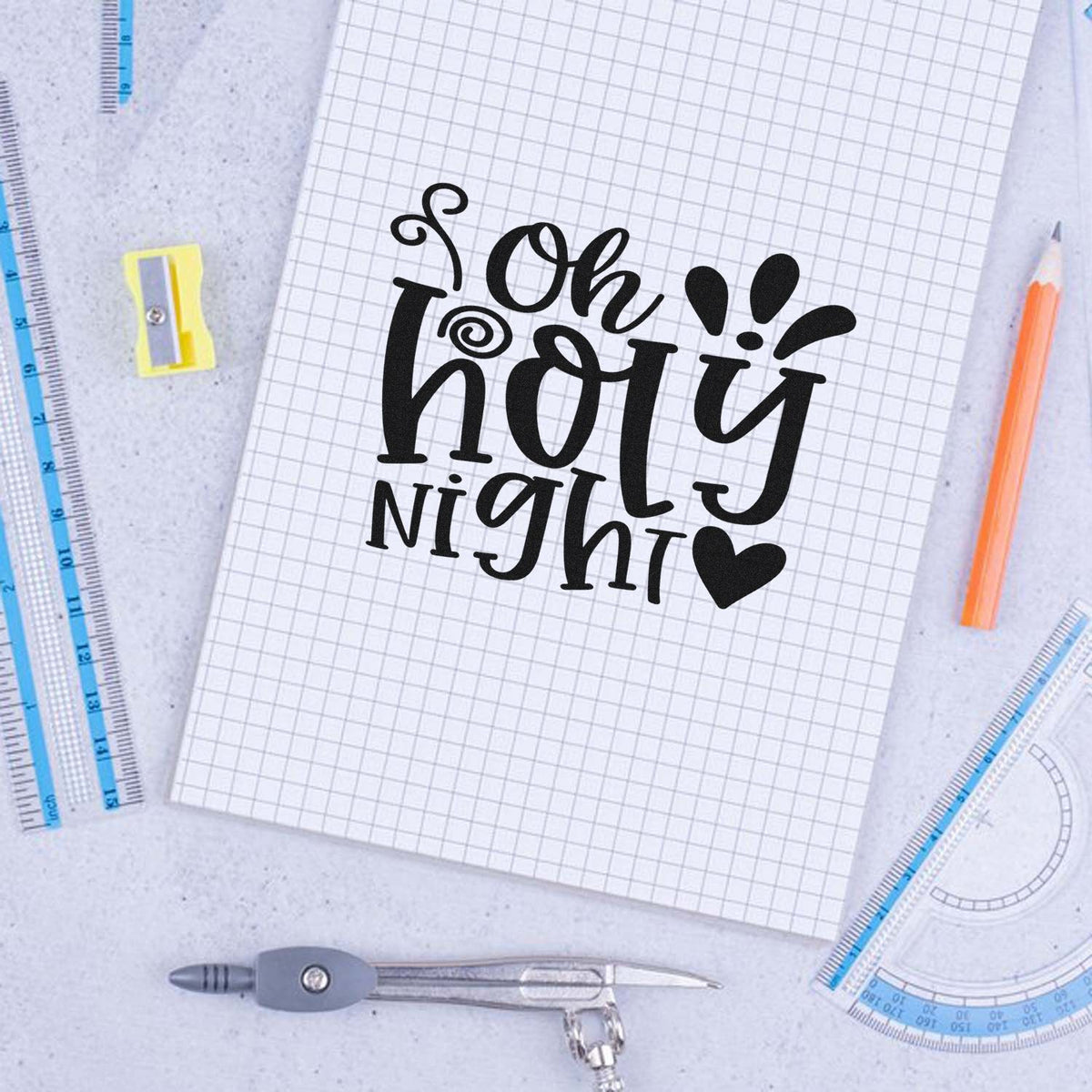 Oh Holy Night Heart Pre-Inked Stamp – PSI imprint stamped in black ink. “Oh Holy Night” appears in ornate bold lettering with accent rays and a solid heart.