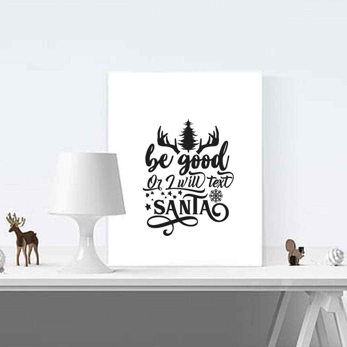 Christmas rubber stamp design with antlers and pine tree, reading Be Good or I Will Text Santa for holiday crafts.