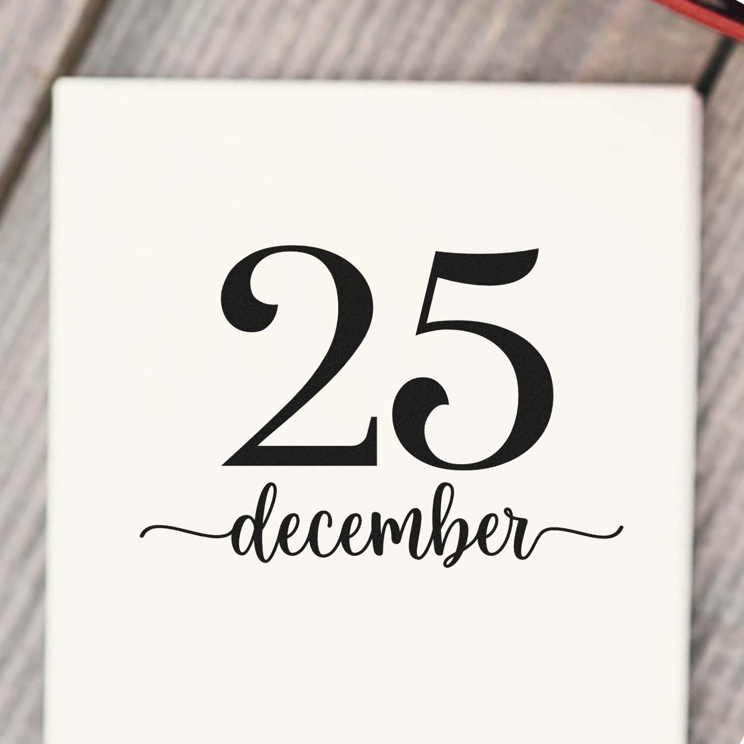 Custom rubber stamp design with December 25 date for Christmas gifts, holiday cards, and festive packaging.