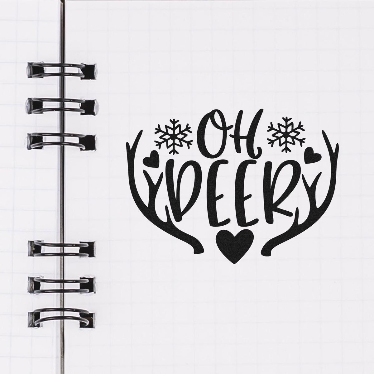 Oh Deer Antlers Snowflakes Pre-Inked Stamp – PSI imprint stamped in black ink. “Oh Deer” is framed by antlers with snowflakes and hearts.