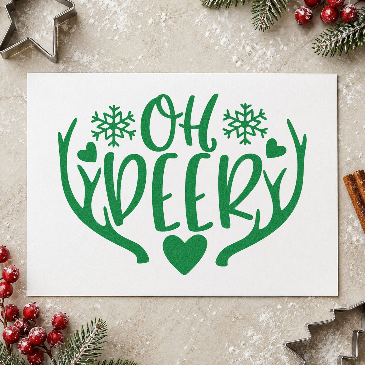 Oh Deer Antlers Snowflakes craft stamp imprint in green ink on a handmade project, one idea being sprinkle shower cards.