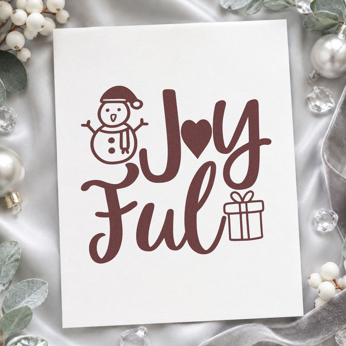 Joyful Snowman And Gift rubber stamp printed in brown ink, ready for rebus puzzle sheet and similar paper crafts.