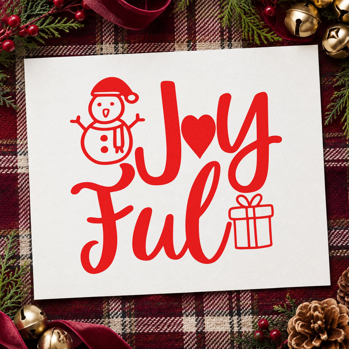 Joyful Snowman And Gift rubber stamp shown in red ink, stamped for projects such as heart jar labels.