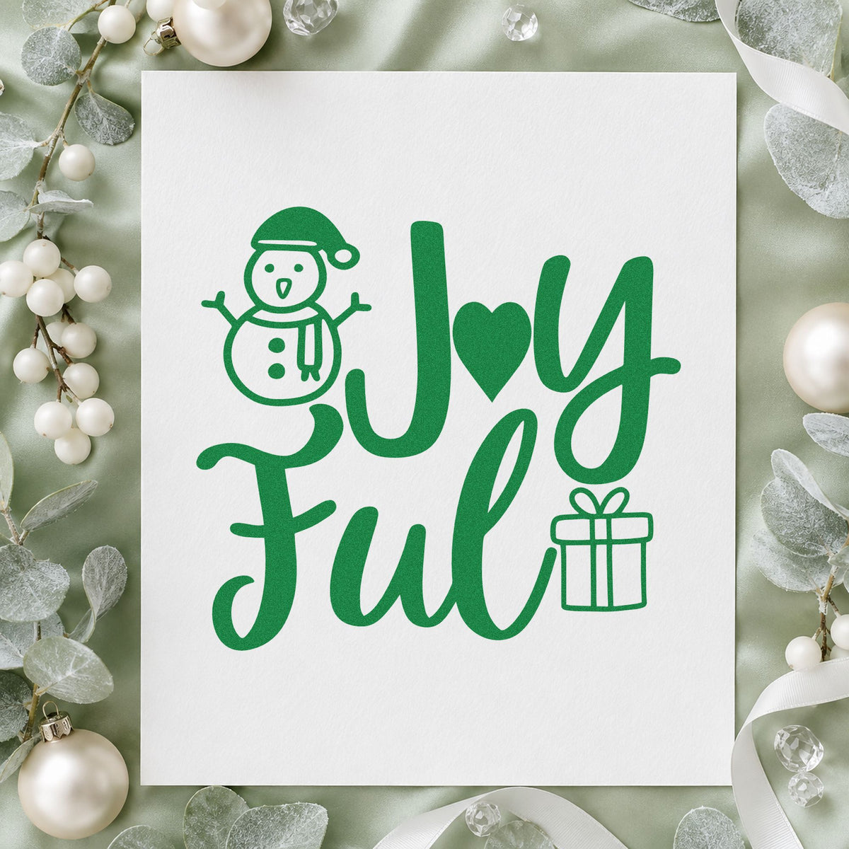 Joyful Snowman And Gift craft stamp imprint in green ink on a handmade project, one idea being valentine style cards.