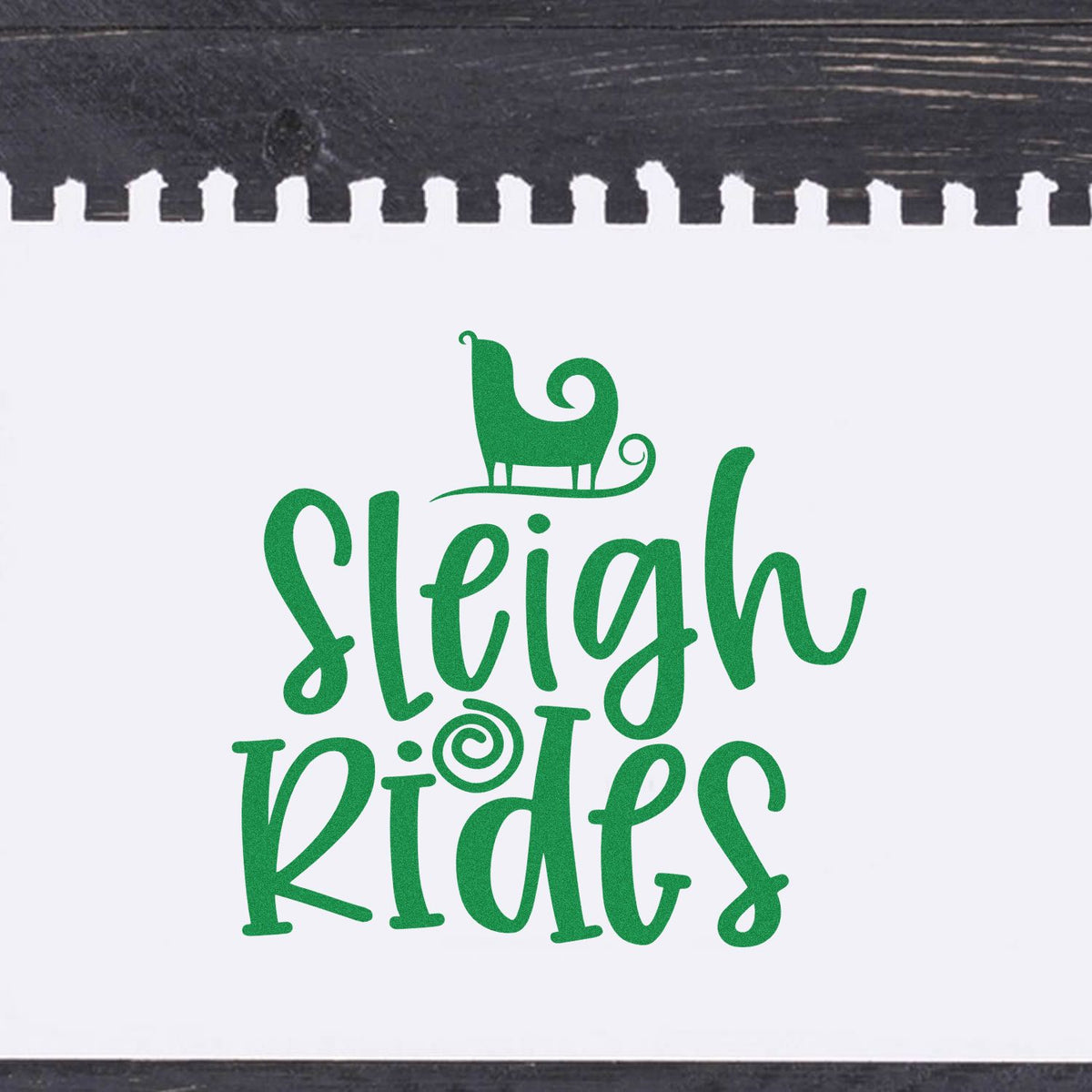 Sleigh Rides Silhouette rubber stamp shown in green ink, stamped for projects such as ride log album page.