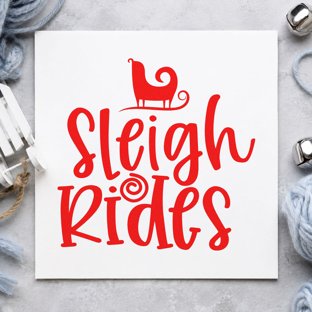 Sleigh Rides Silhouette craft stamp in red ink on cardstock, an easy option for bench throw printing.