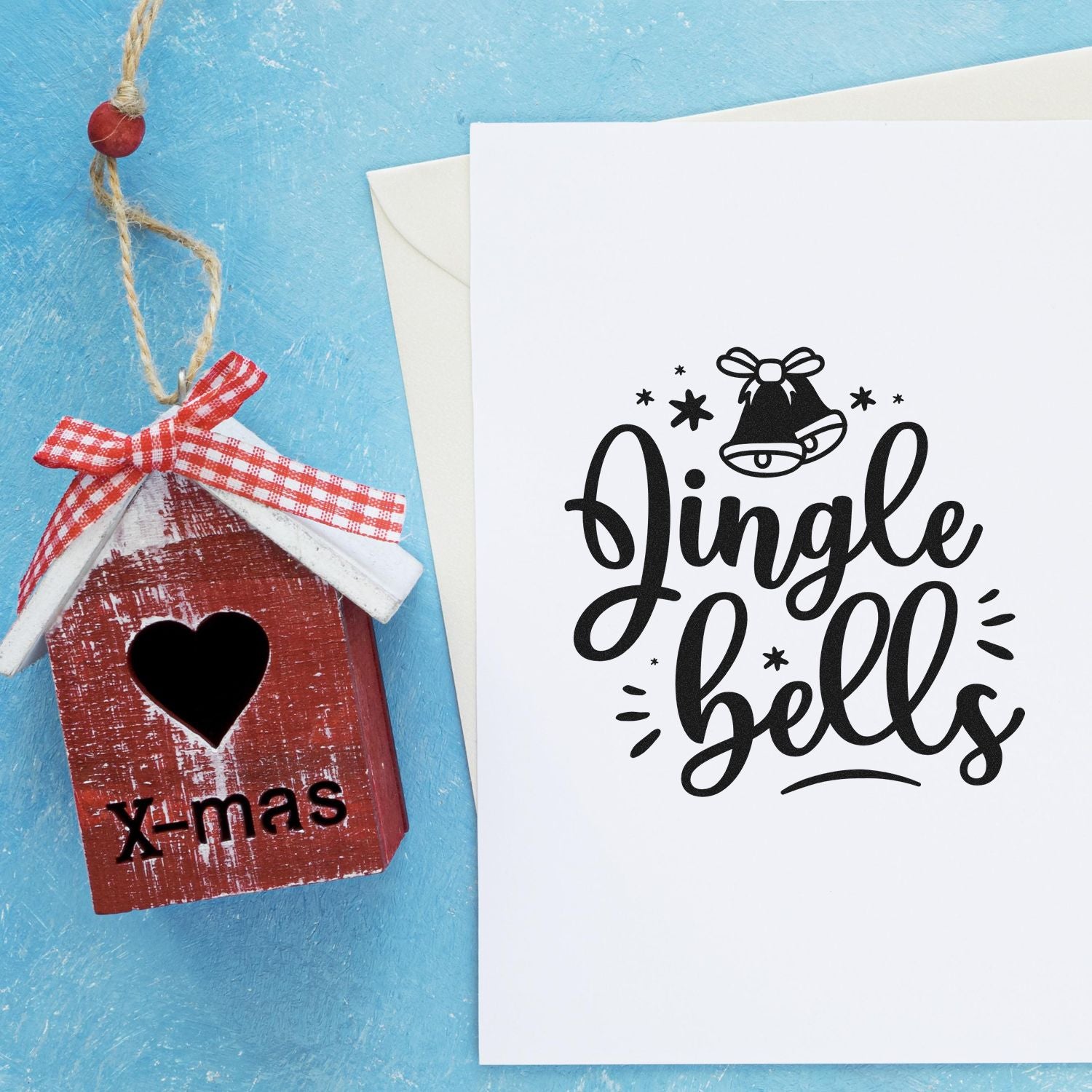 Christmas rubber stamp design with Jingle Bells lettering for handmade holiday cards and festive paper crafts.