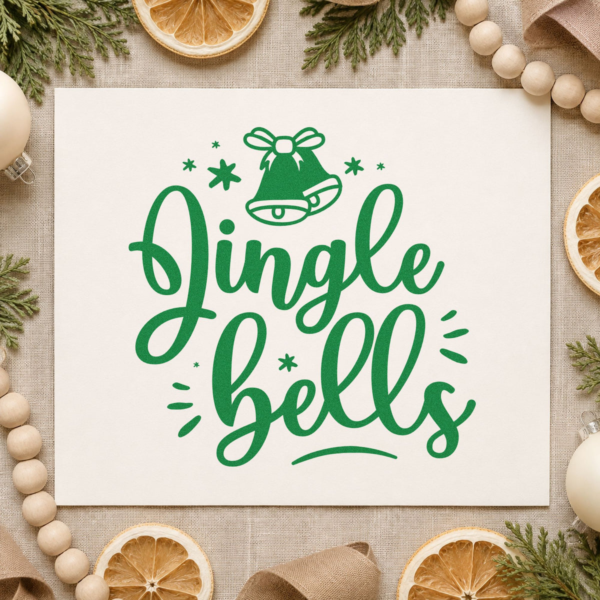 Jingle Bells Bow Bell craft stamp imprint in green ink on a handmade project, one idea being class sample cards.