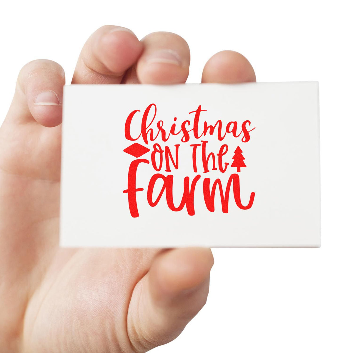 Christmas on the Farm rubber stamp with red holiday lettering, ideal for festive farm-themed crafts and cards.