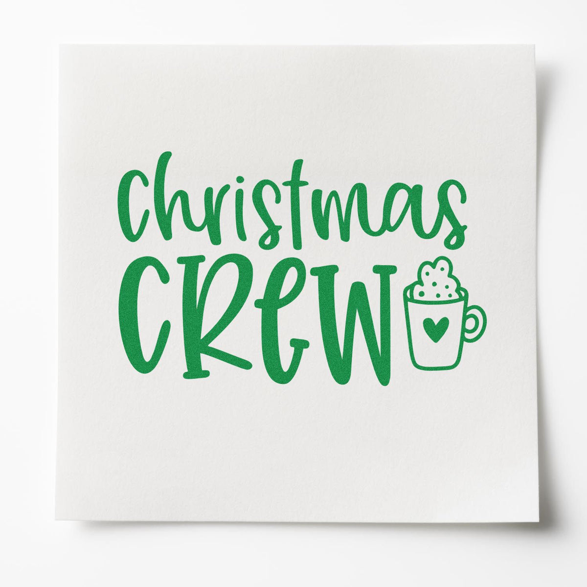Christmas Crew rubber stamp design with festive mug icon, ideal for holiday cards and craft projects.