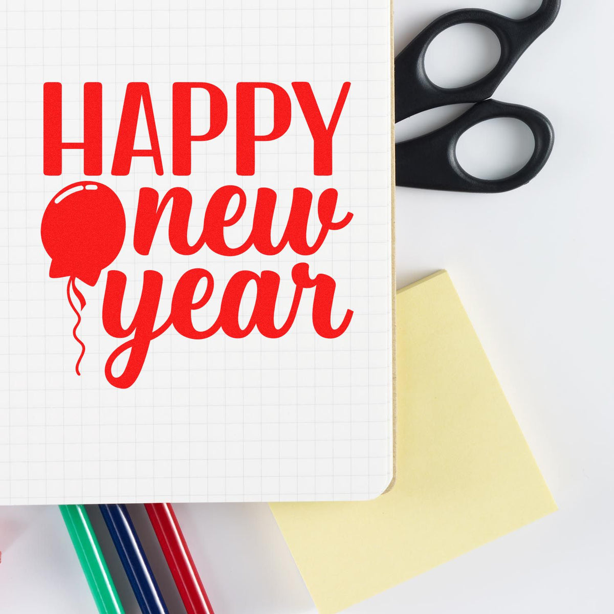 Happy New Year rubber stamp design in red with balloon graphic, perfect for holiday cards, scrapbooking, and stationery.