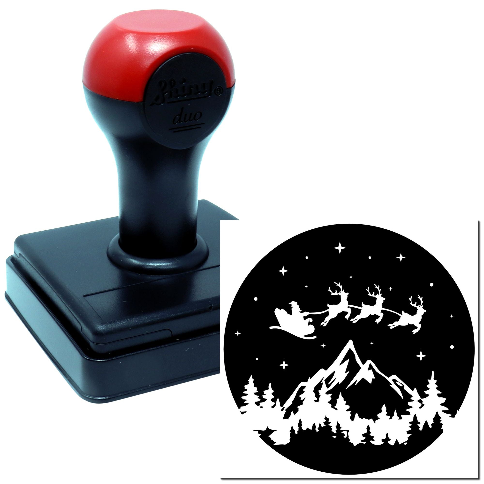 Custom rubber stamp for holiday crafts, featuring Santa sleigh, reindeer, mountains, and forest scene.