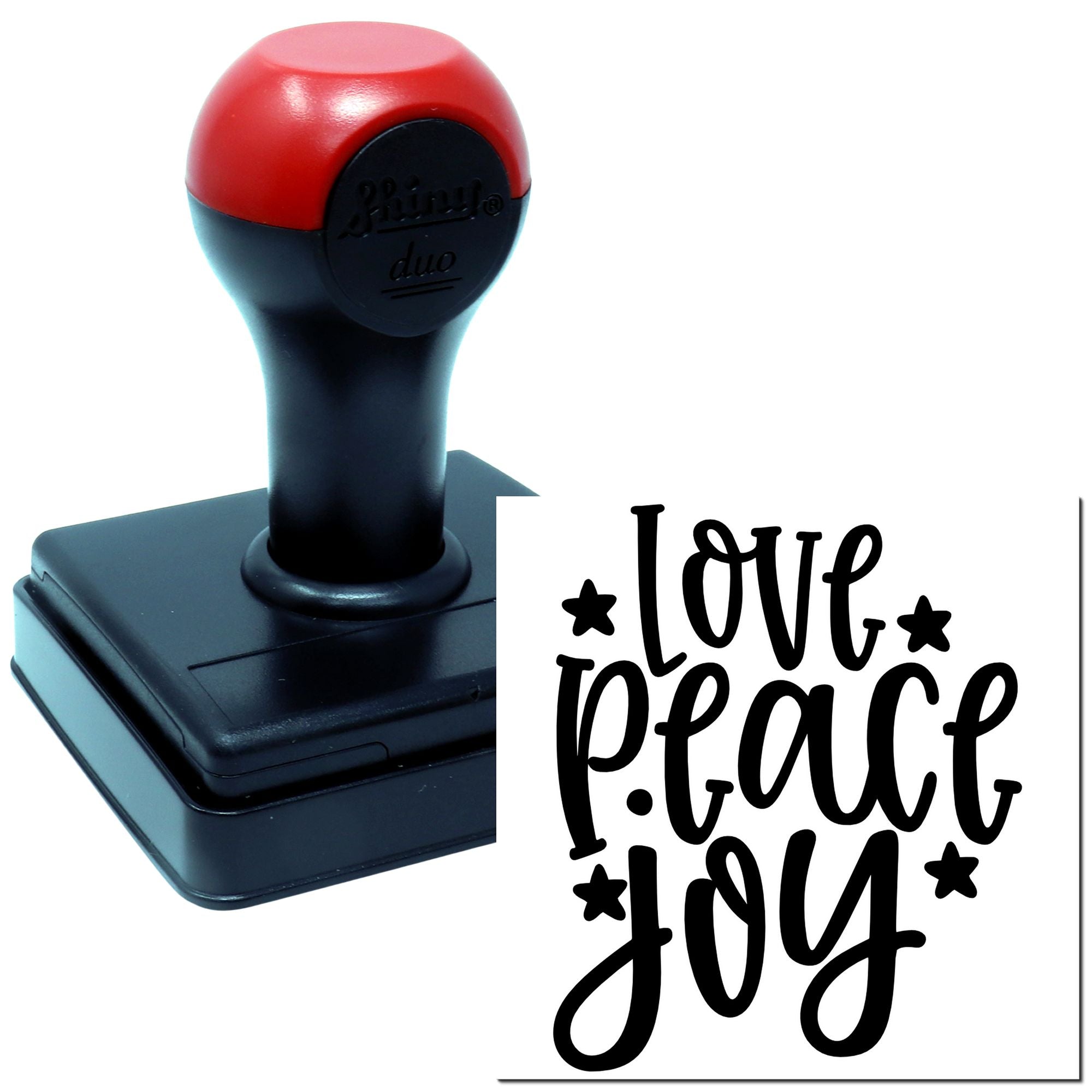 Self-inking rubber stamp with Love Peace Joy design for handmade cards, scrapbooking, and inspirational crafting.
