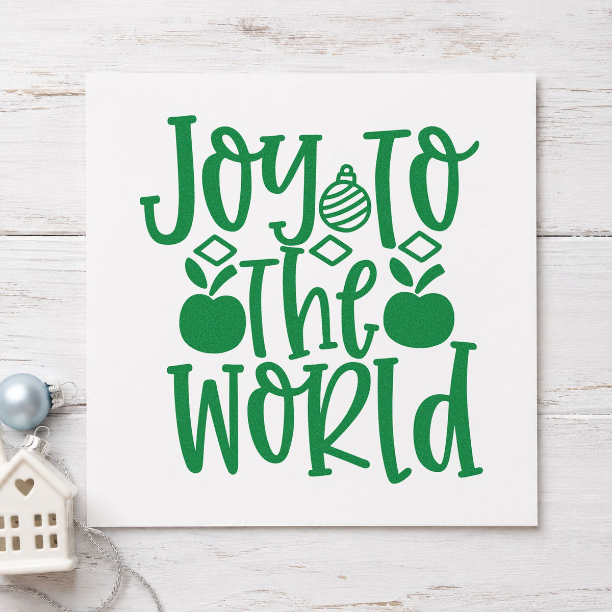 Joy To The World Ornaments craft stamp imprint in green ink on a handmade project, one idea being swap entry cards.