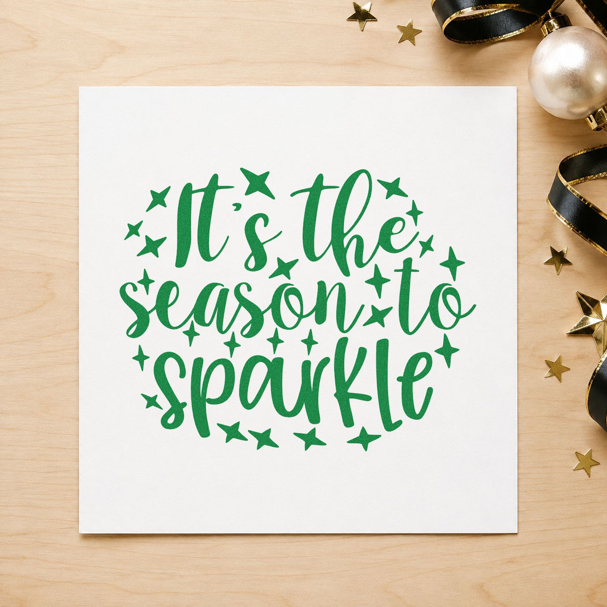 Season To Sparkle Stars craft stamp imprint in green ink on a handmade project, one idea being jewelry gift tags.