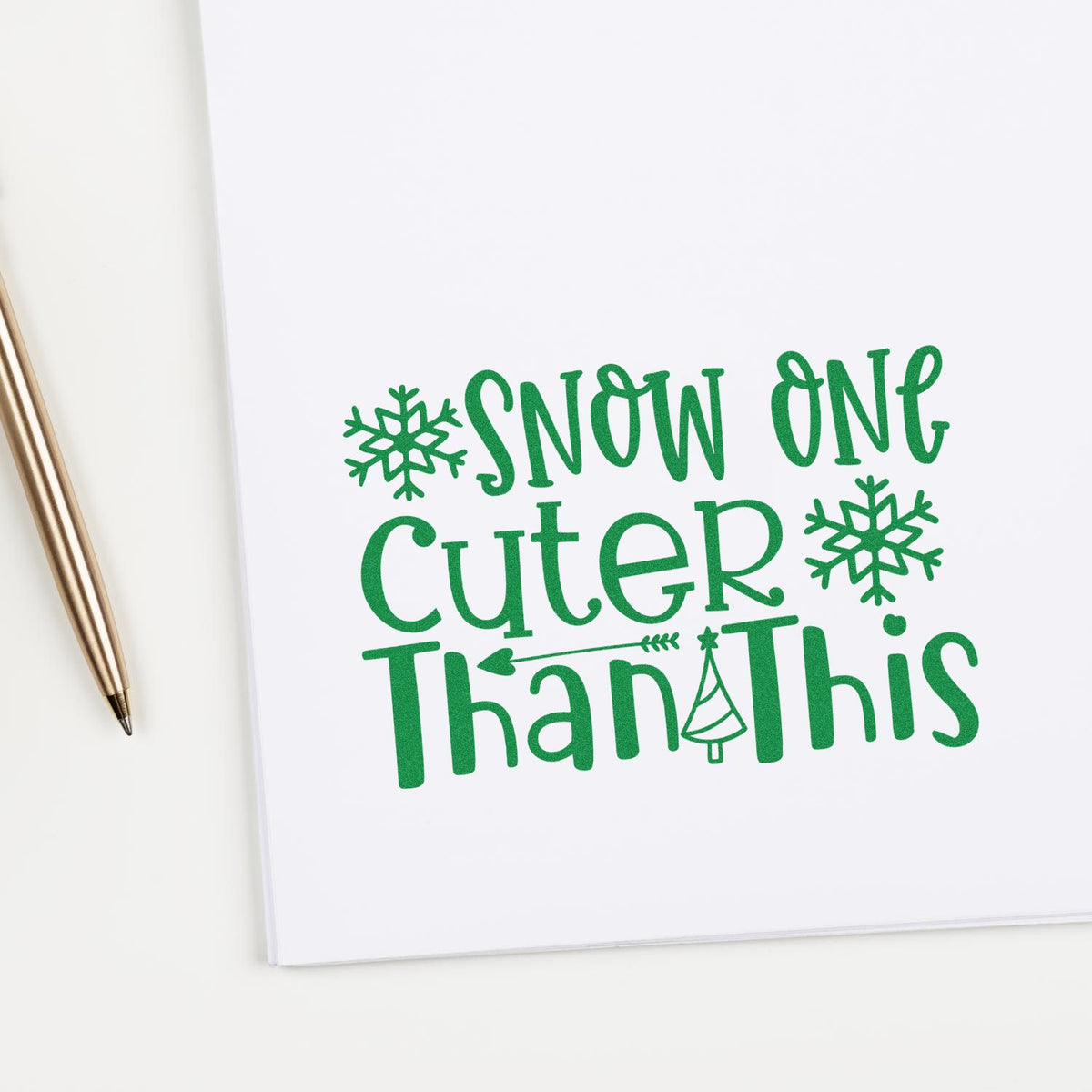 Christmas rubber stamp design with Snow One Cuter Than This text and snowflakes for holiday cards and crafts.