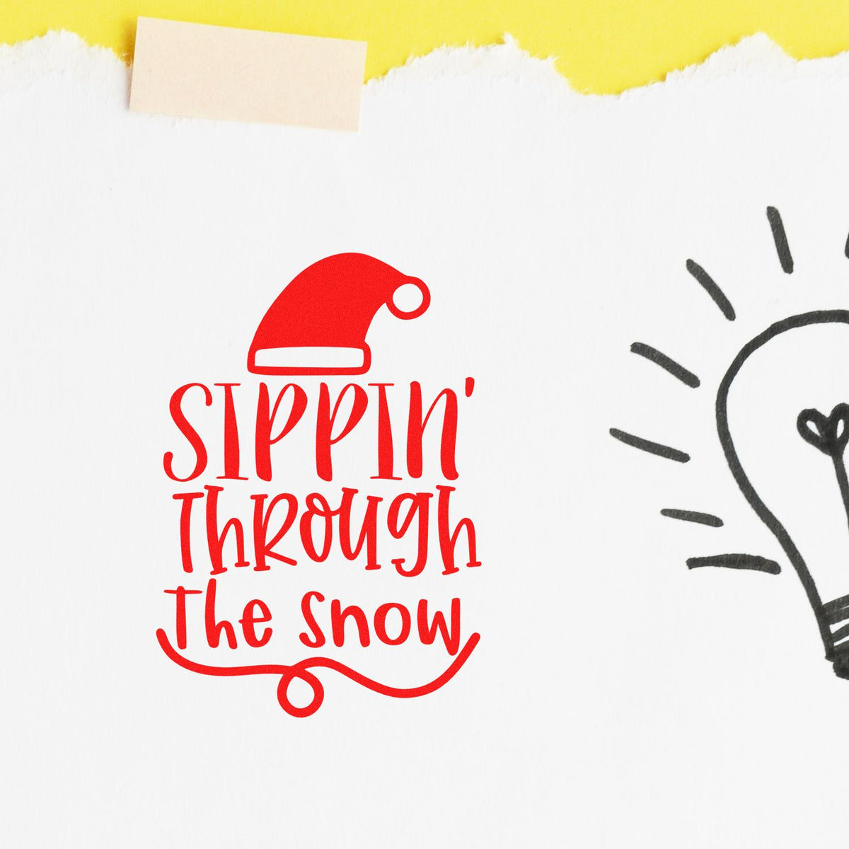 Christmas rubber stamp design with red Sippin Through the Snow lettering and Santa hat on white paper