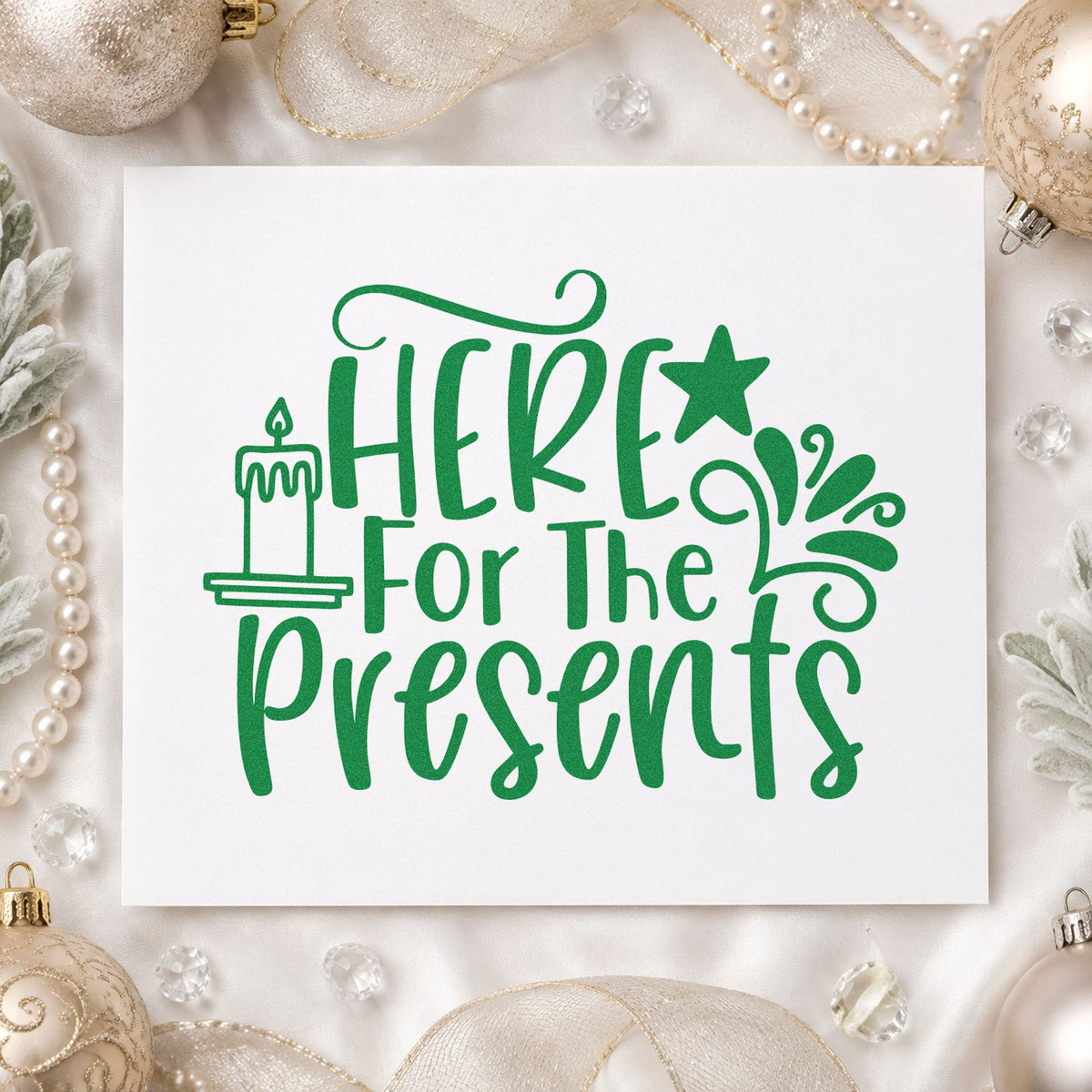 Here For The Presents craft stamp imprint in green ink on a handmade project, one idea being exchange rule cards.