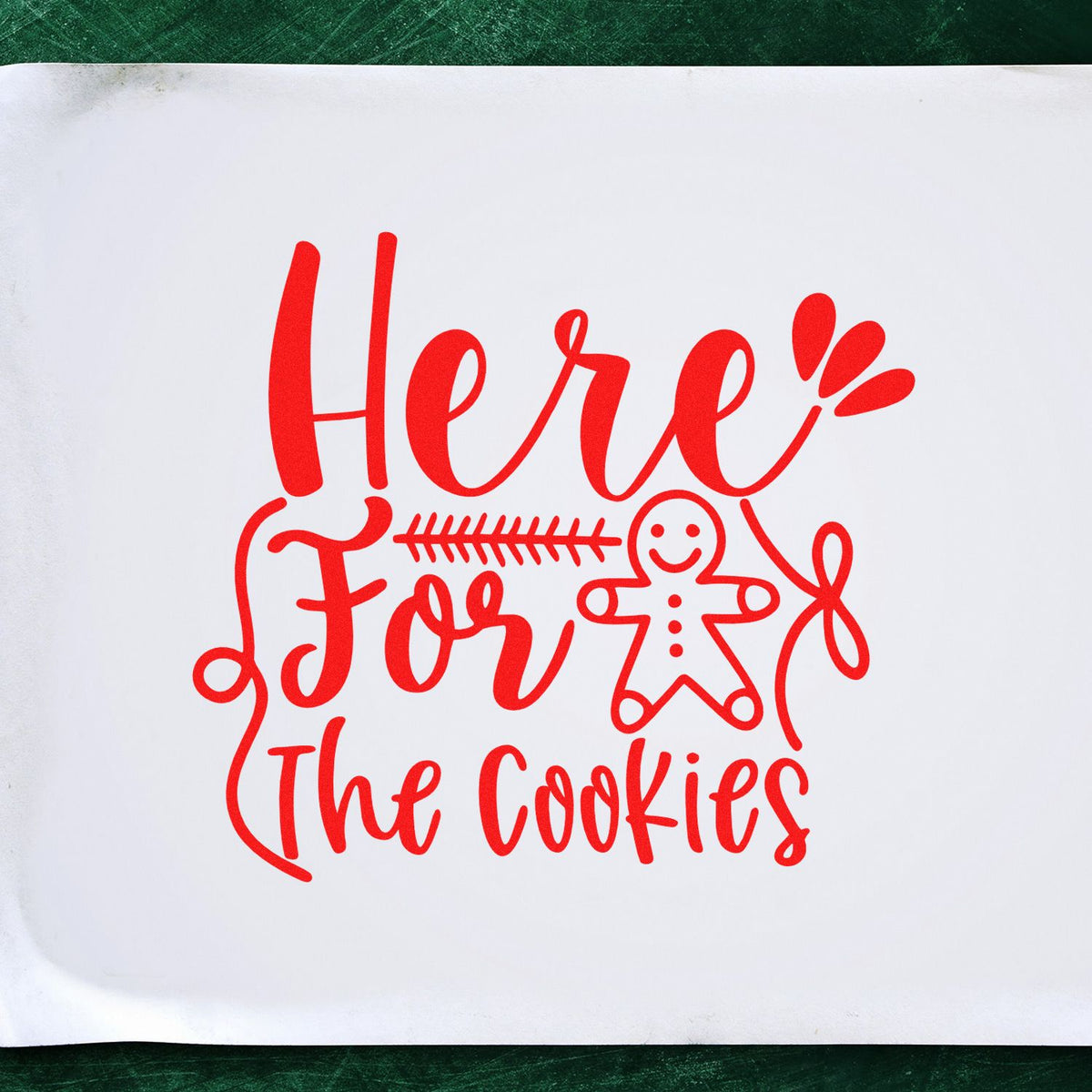 Holiday cookie rubber stamp design with Here for the Cookies and gingerbread man illustration in red.