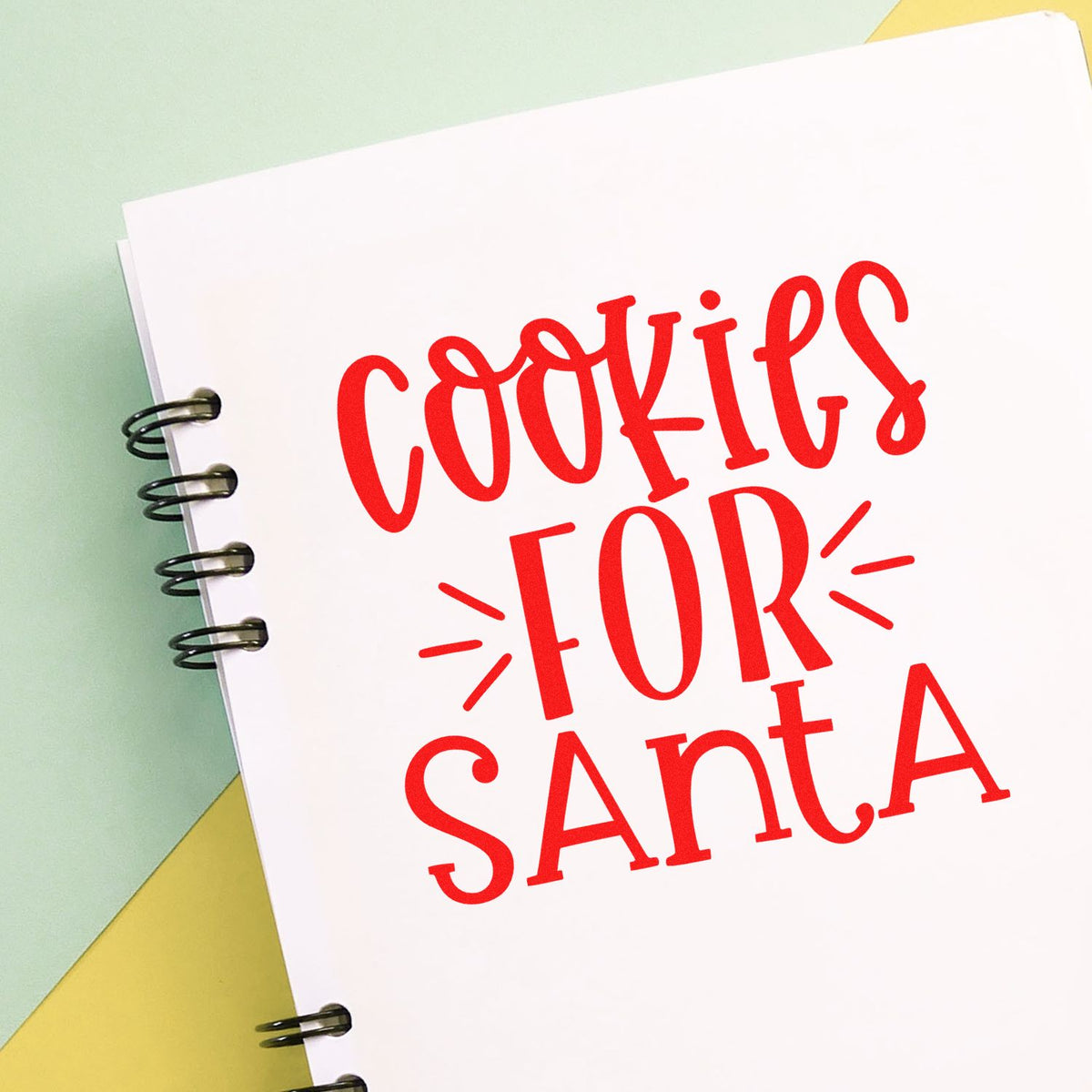 Cookies for Santa rubber stamp design on notebook page, ideal for holiday baking, gift tags, and festive Christmas crafts.