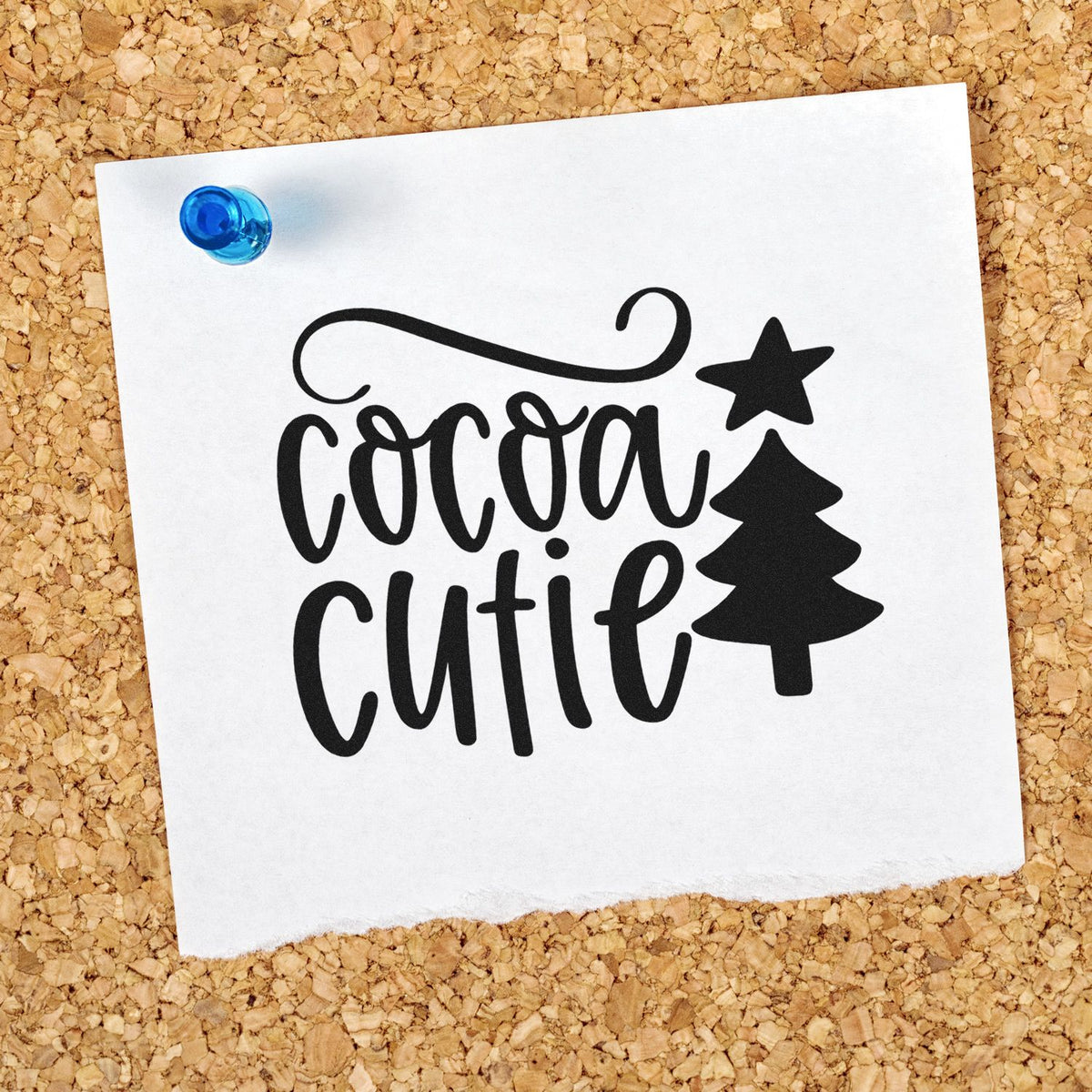 Cocoa Cutie Christmas Tree With Stars PSI Pre-Inked Stamp imprint stamped in black ink. The words "Cocoa cutie" sit beside a solid Christmas tree topped by a star.