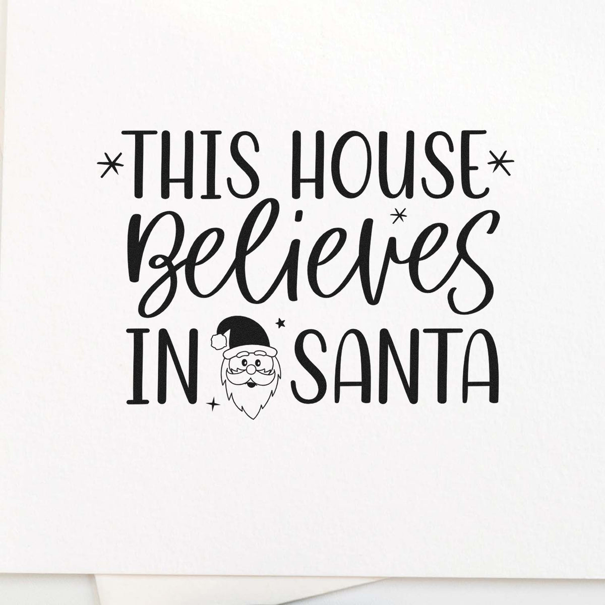 This House Believes in Santa Christmas rubber stamp with Santa graphic for holiday cards, crafts, and festive decor.
