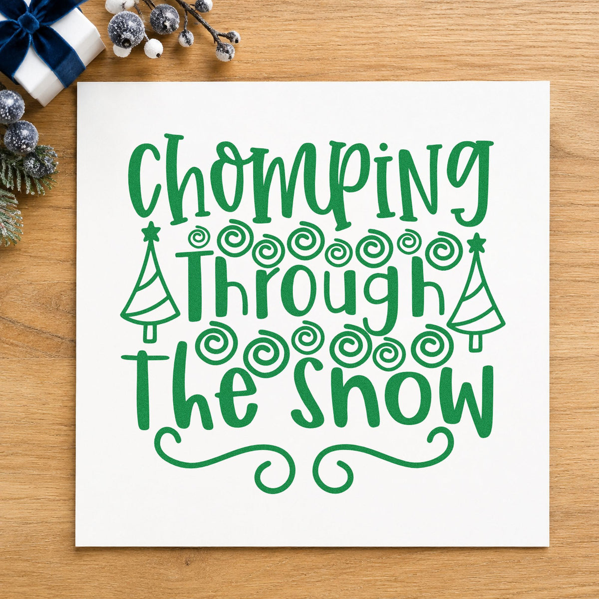 Chomping Through The Snow craft stamp imprint in green ink on a handmade project, one idea being tasting row cards.