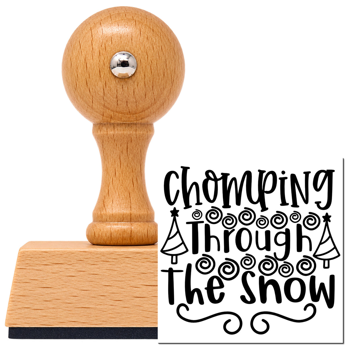 Chomping Through The Snow Tree Motif Vintage Pro rubber stamp in European beech wood with a round knob handle, shown beside its black imprint.