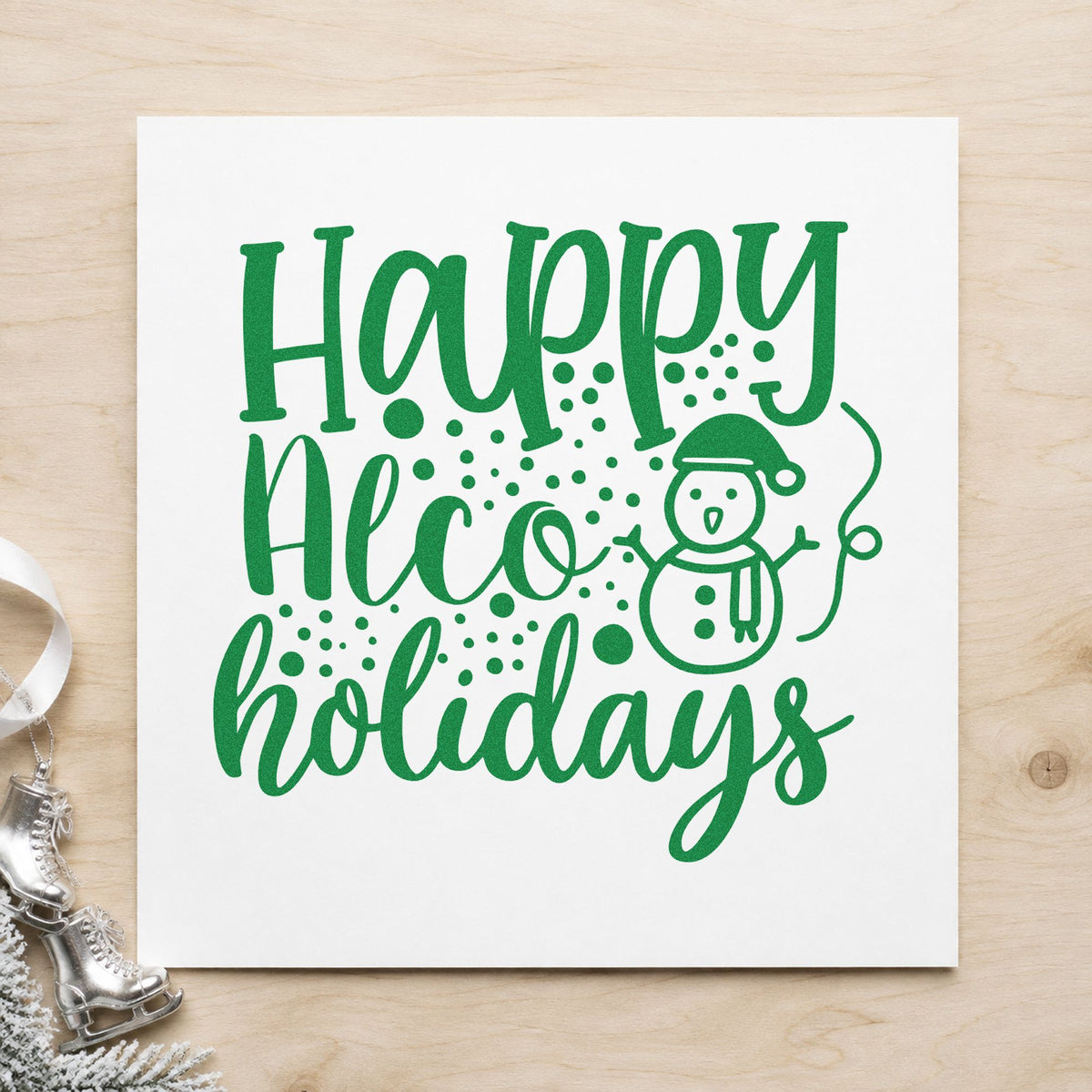 Happy Alco Holidays Snowman craft stamp imprinted in green ink on paper, a design suited to framed cart shelf.