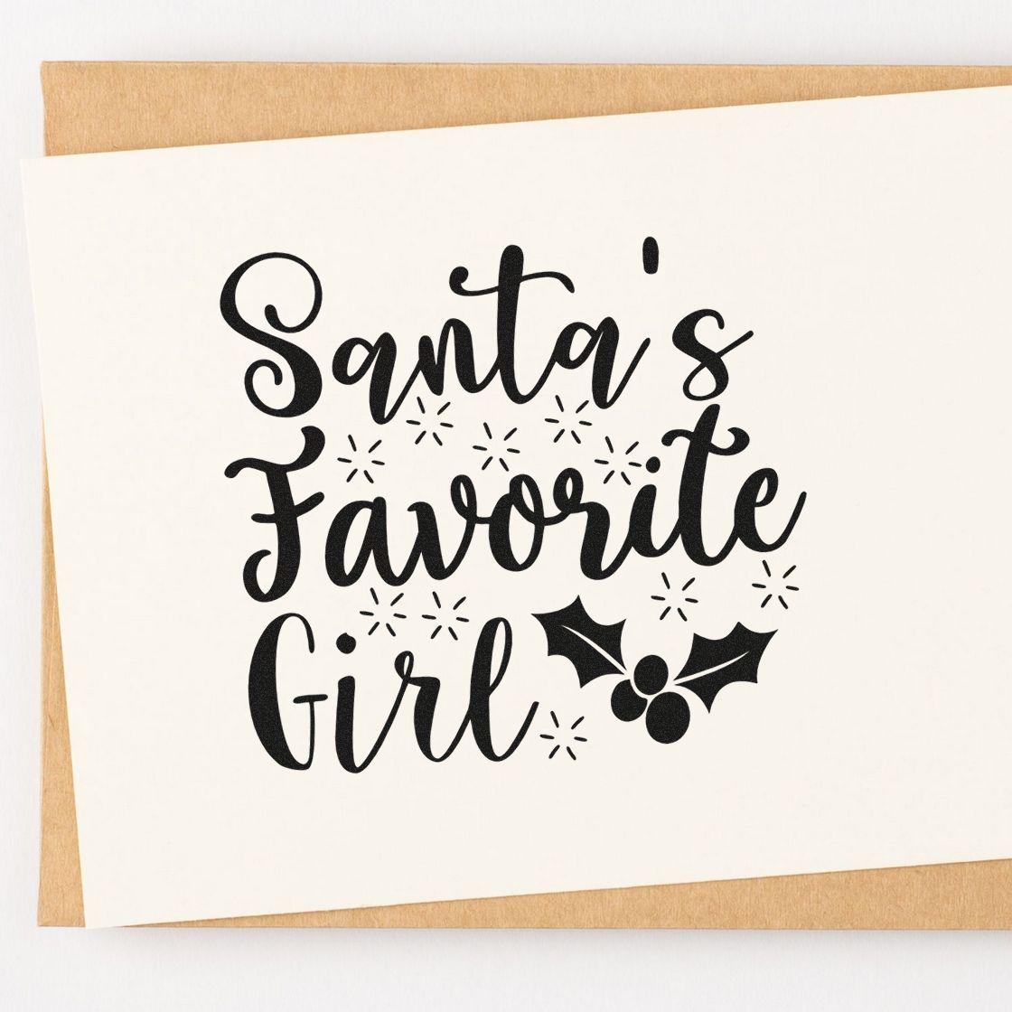 Santas Favorite Girl holiday rubber stamp design with holly accents, perfect for Christmas cards, gifts, and crafts.