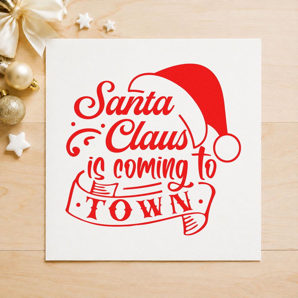 Santa Claus Coming To Town craft stamp in red ink on cardstock, an easy option for chair drape printing.