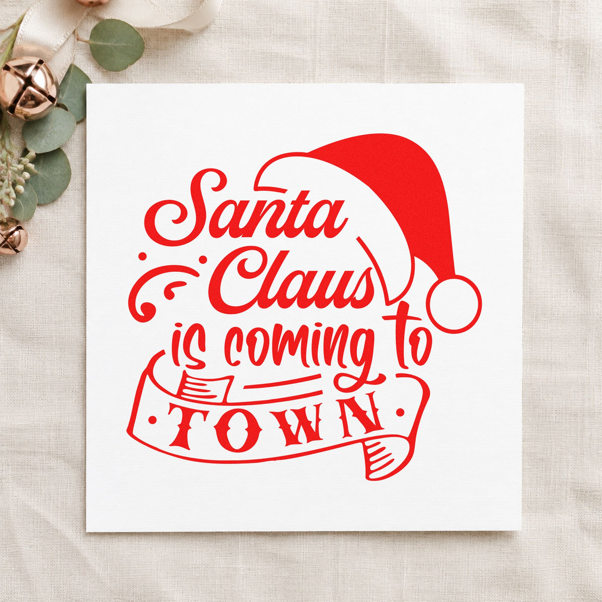 Santa Claus Coming To Town rubber stamp shown in red ink, stamped for projects such as prop crate labels.