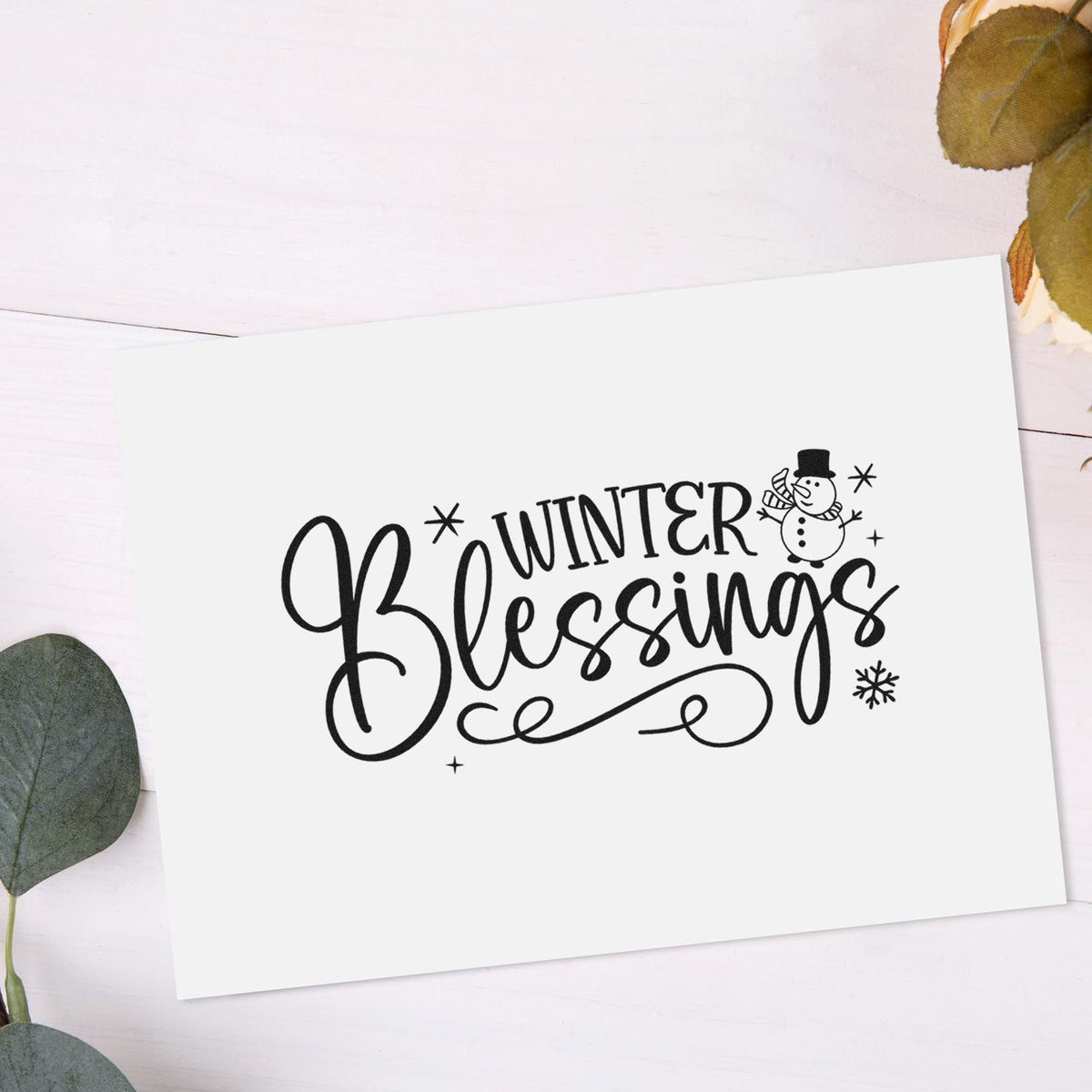 Winter Blessings rubber stamp design with snowman and snowflakes, perfect for handmade holiday cards and winter crafts.