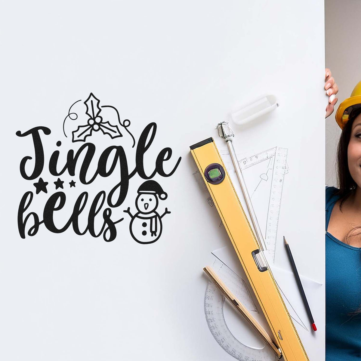 Jingle Bells Holly Snowman Stamp – PSI Pre-Inked imprint stamped in black ink. The words "Jingle bells" appear beneath holly leaves beside stars and a small snowman.