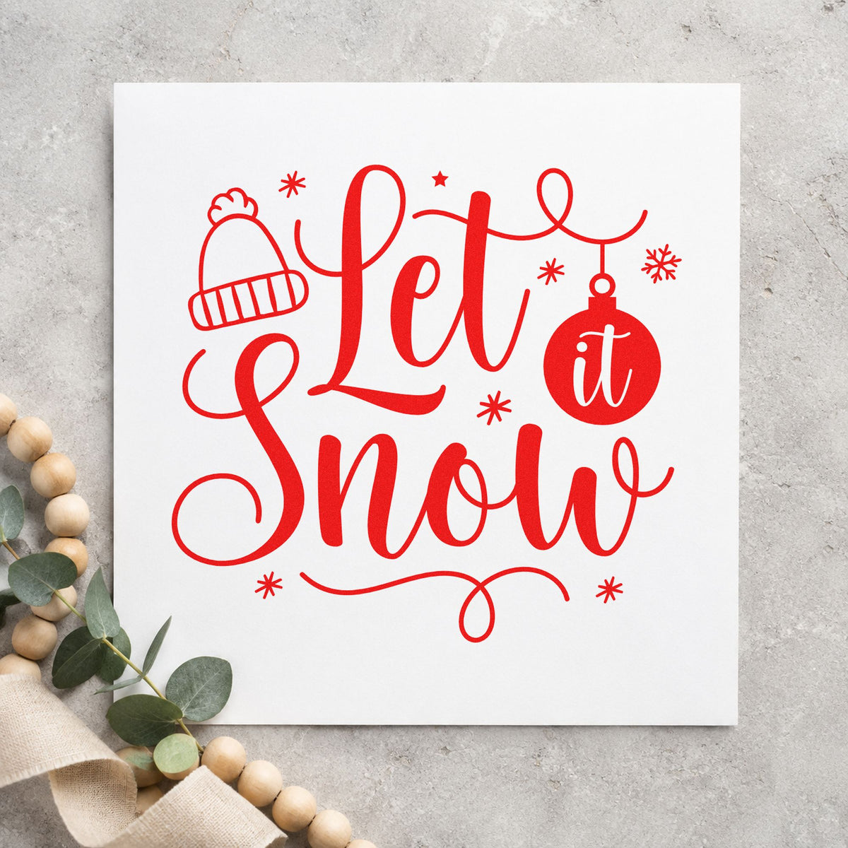 Let It Snow Winter Hat rubber stamp shown in red ink, stamped for projects such as size bin labels.