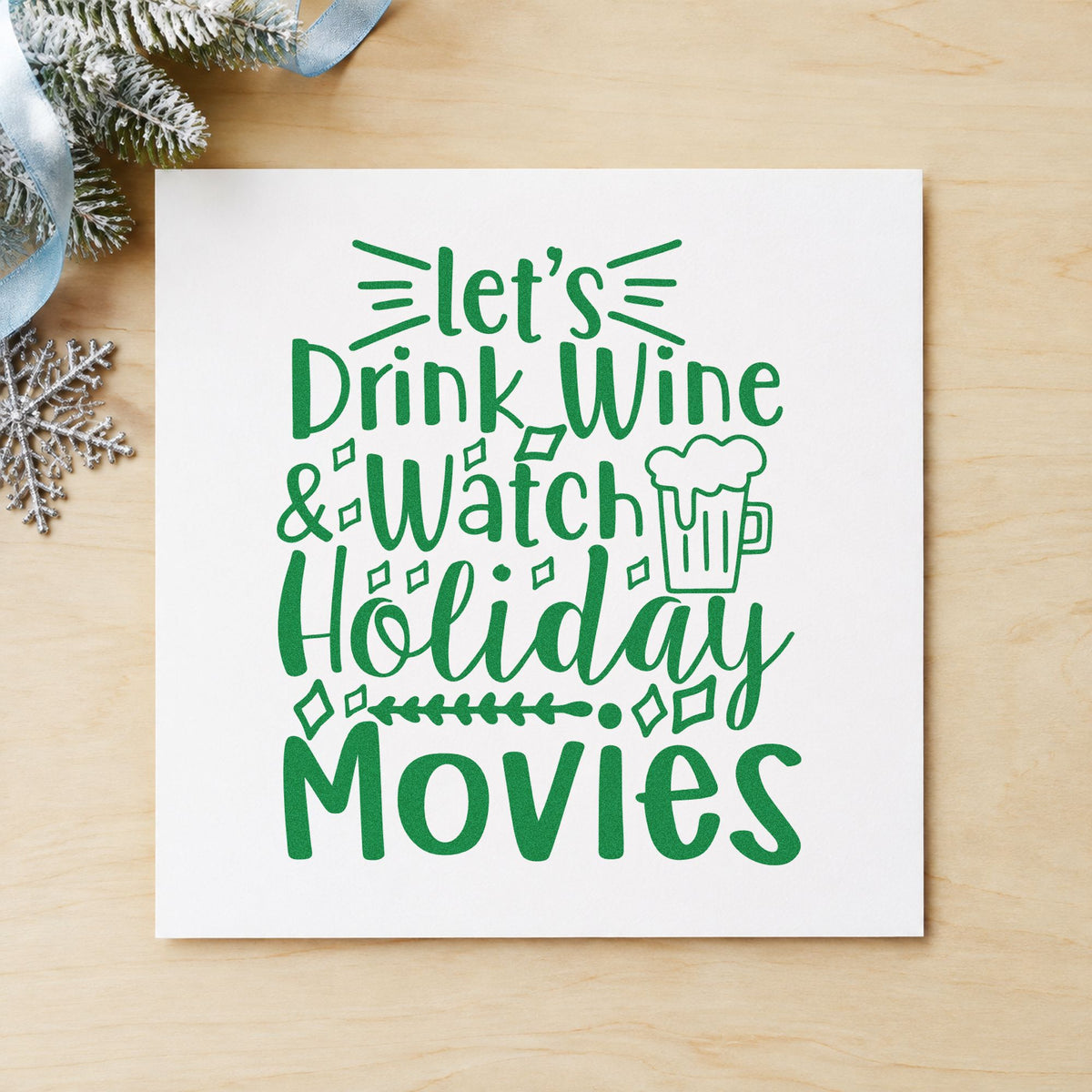 Wine And Holiday Movies craft stamp imprint in green ink on a handmade project, one idea being pairing bottle tags.