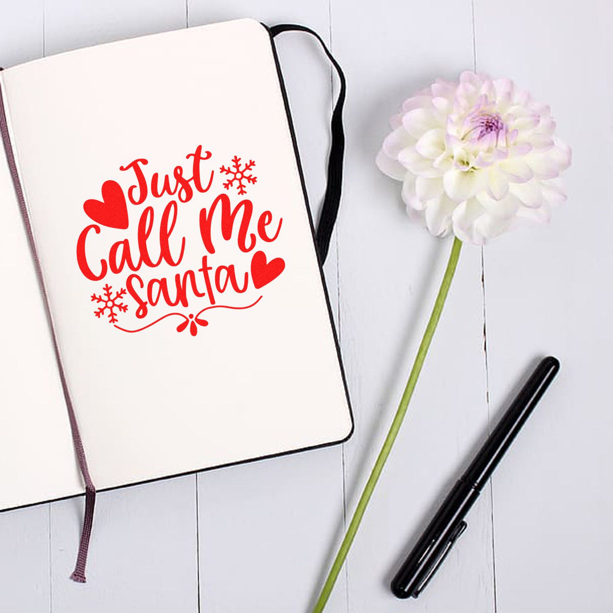 Christmas rubber stamp design reading Just Call Me Santa with hearts and snowflakes, perfect for holiday cards and crafts.