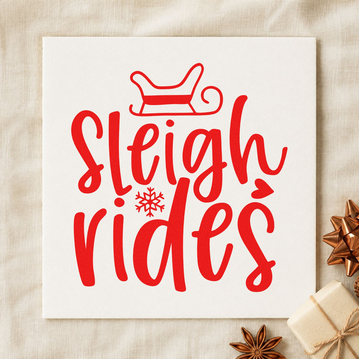 Sleigh Rides With Snowflake craft stamp in red ink on cardstock, an easy option for lap blanket printing.
