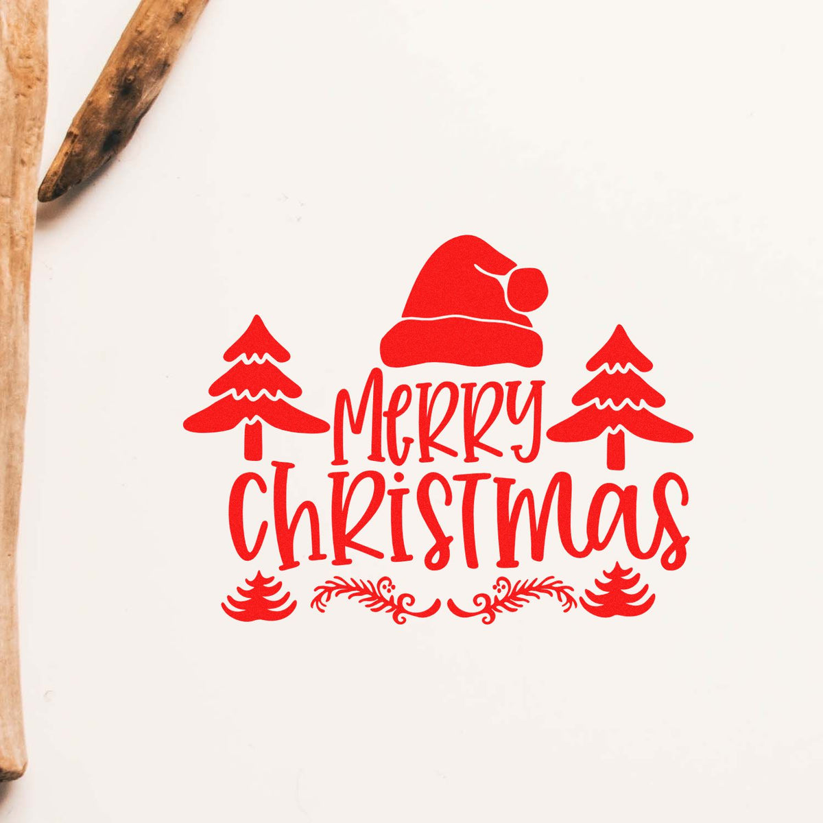 Merry Christmas rubber stamp design with Santa hat and pine trees, ideal for holiday cards and festive packaging.