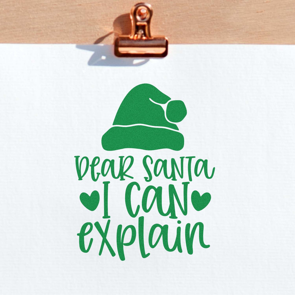 Dear Santa I Can Explain Christmas rubber stamp design with Santa hat graphic for holiday cards and crafts.