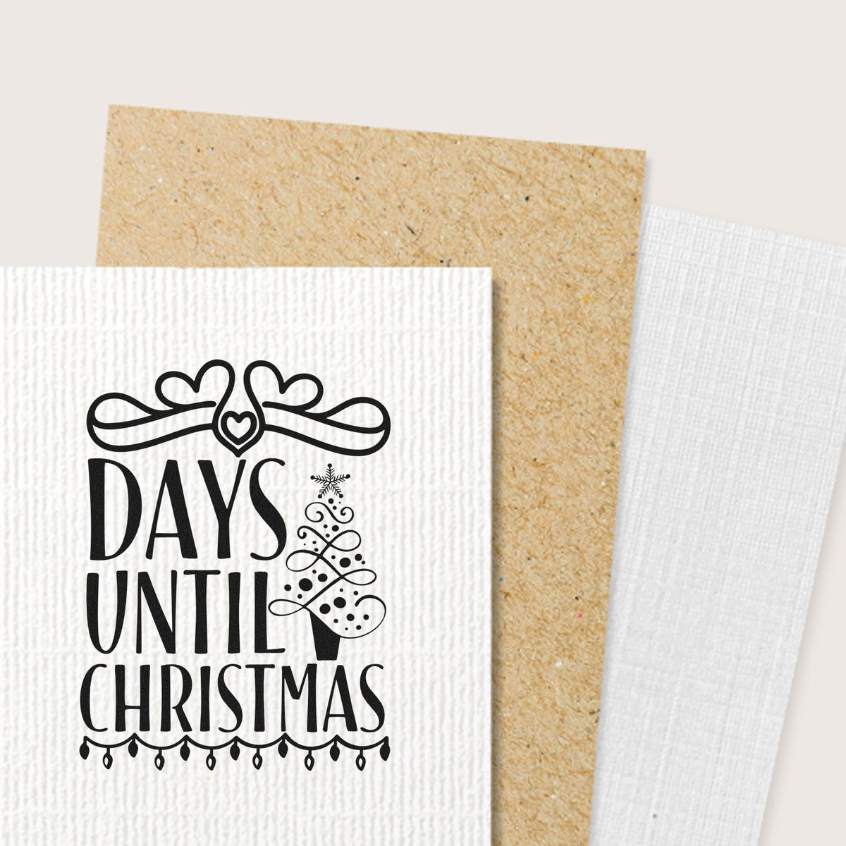 Christmas countdown rubber stamp reading Days Until Christmas with festive tree and heart ornament for holiday cards.
