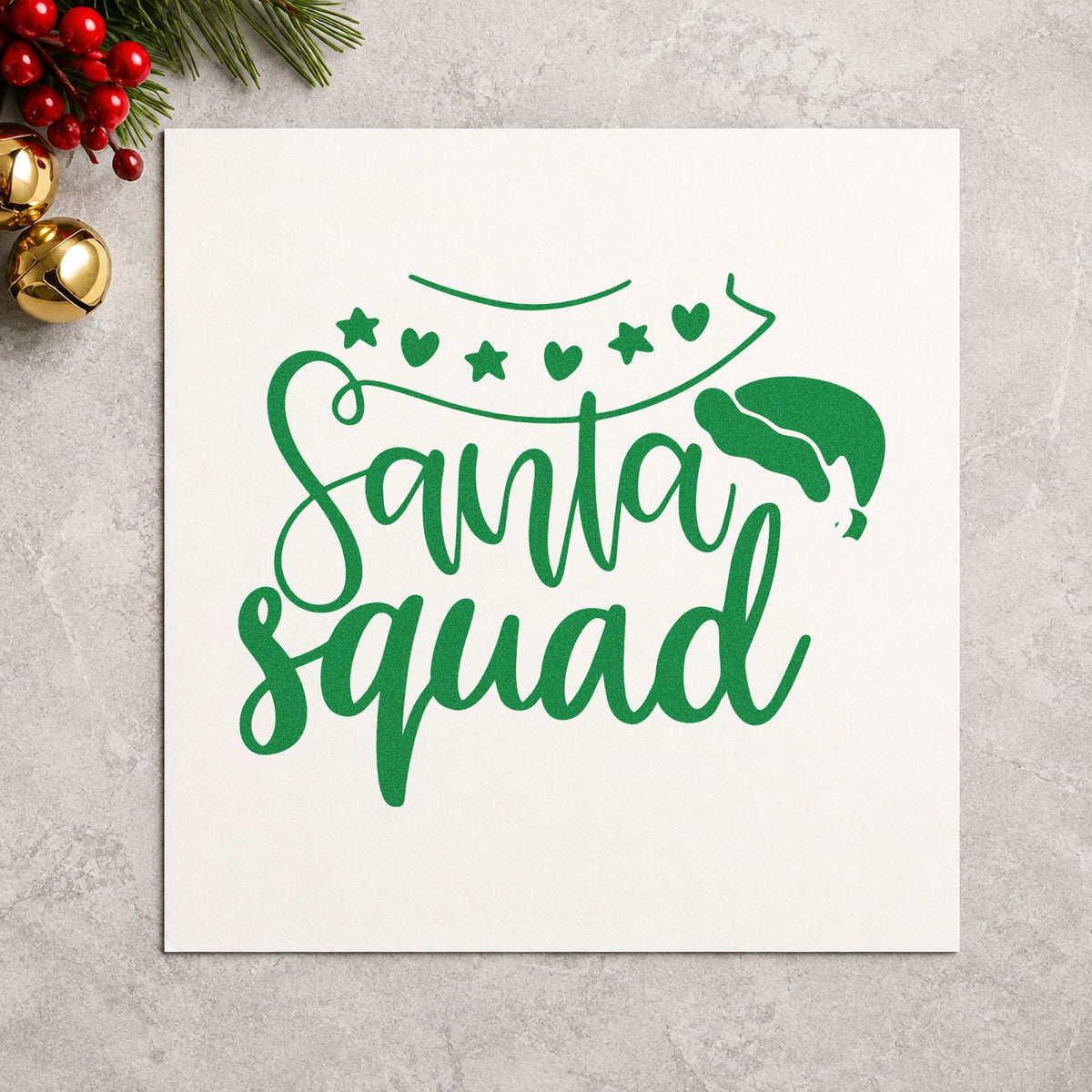 Santa Squad Heart Garland craft stamp imprint in green ink on a handmade project, one idea being garland loop tags.