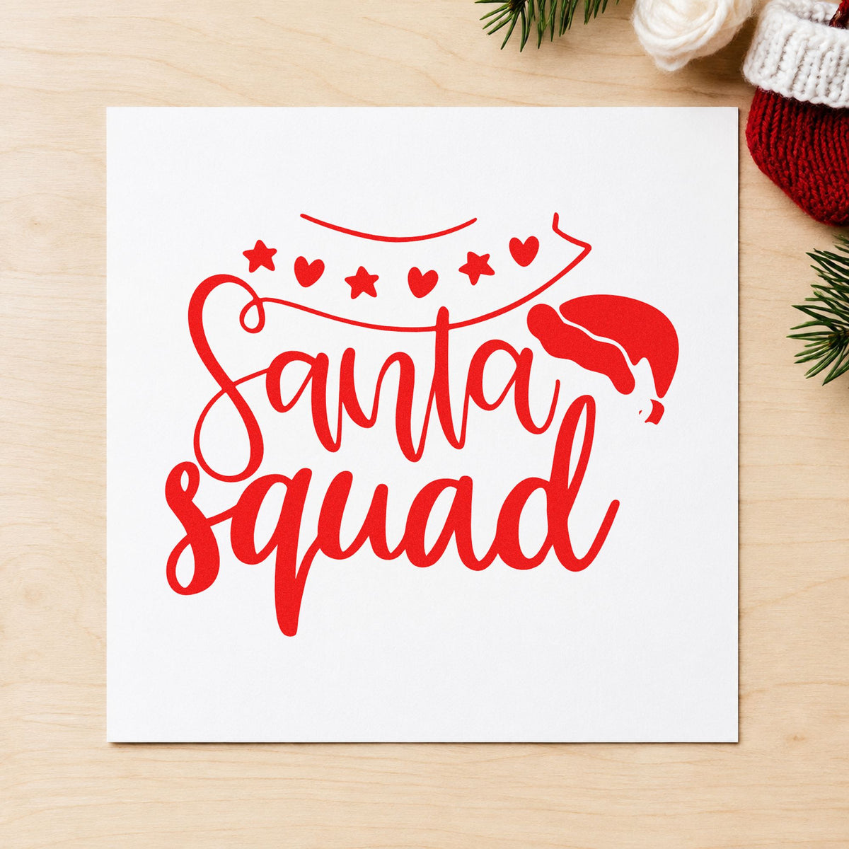Santa Squad Heart Garland craft stamp in red ink on cardstock, an easy option for bunting cord printing.