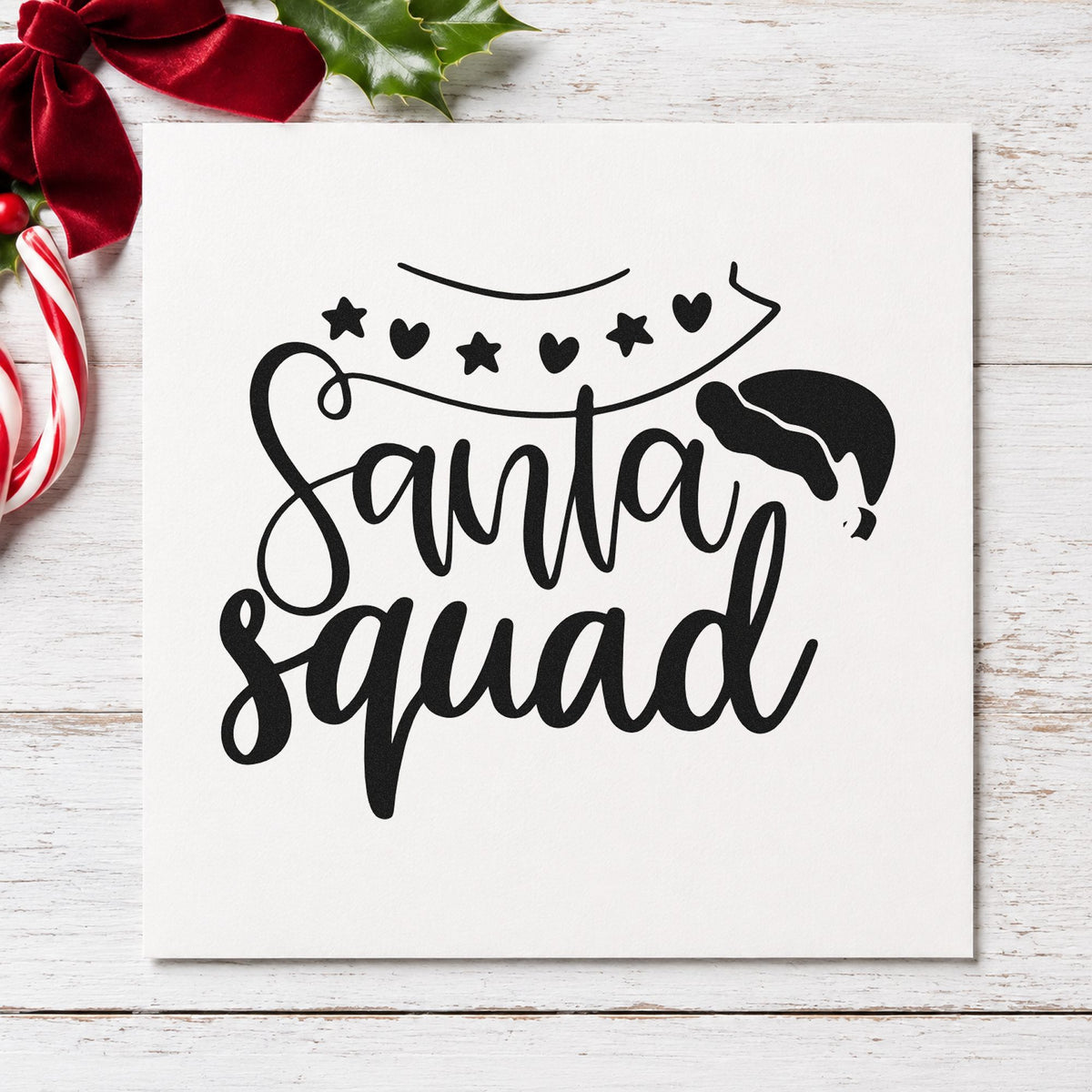 Santa Squad Heart Garland rubber stamp printed in black ink, ready for garland above cards and similar paper crafts.