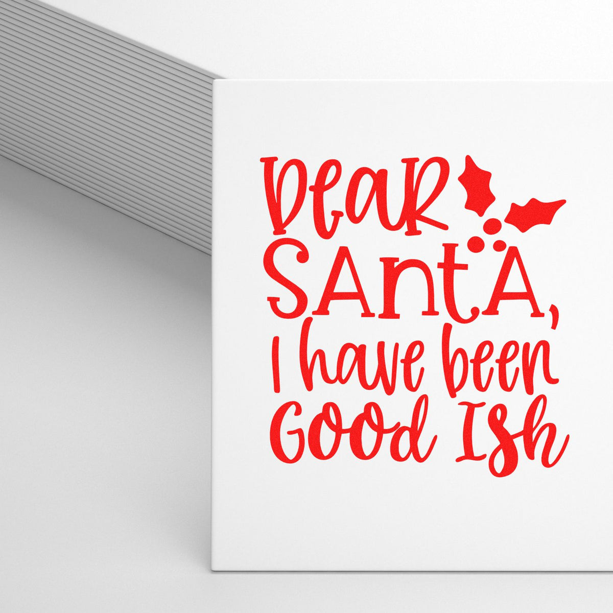 Christmas rubber stamp design with red Dear Santa, I have been Good Ish holiday greeting on a white card.