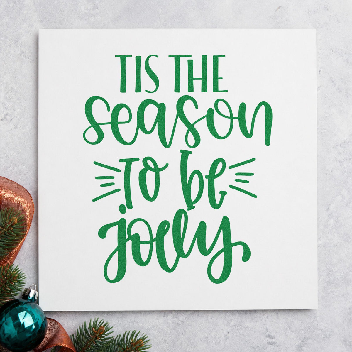 Tis The Season Jolly craft stamp imprint in green ink on a handmade project, one idea being agenda point cards.