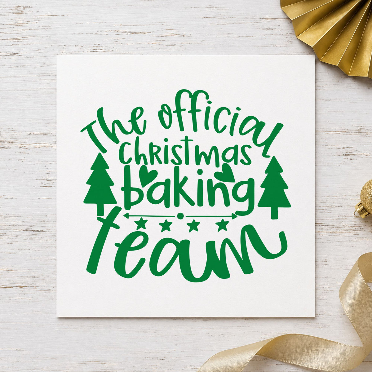 Official Christmas Baking Team craft stamp imprint in green ink on a handmade project, one idea being entry number tags.