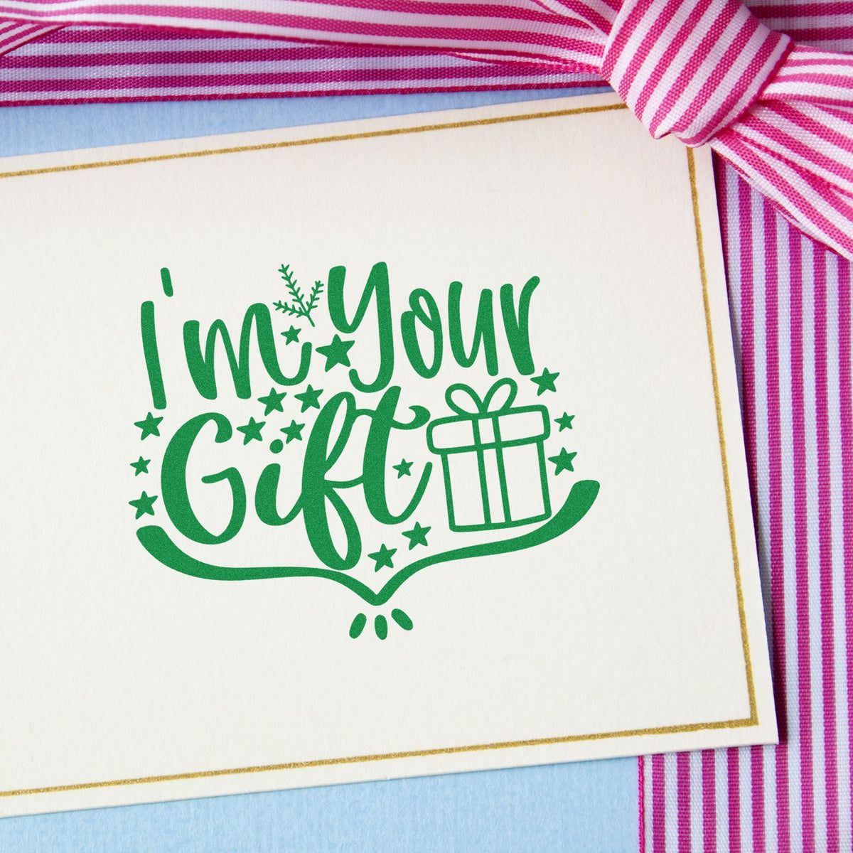 Green Im Your Gift rubber stamp design with present icon, ideal for holiday cards and gift packaging.