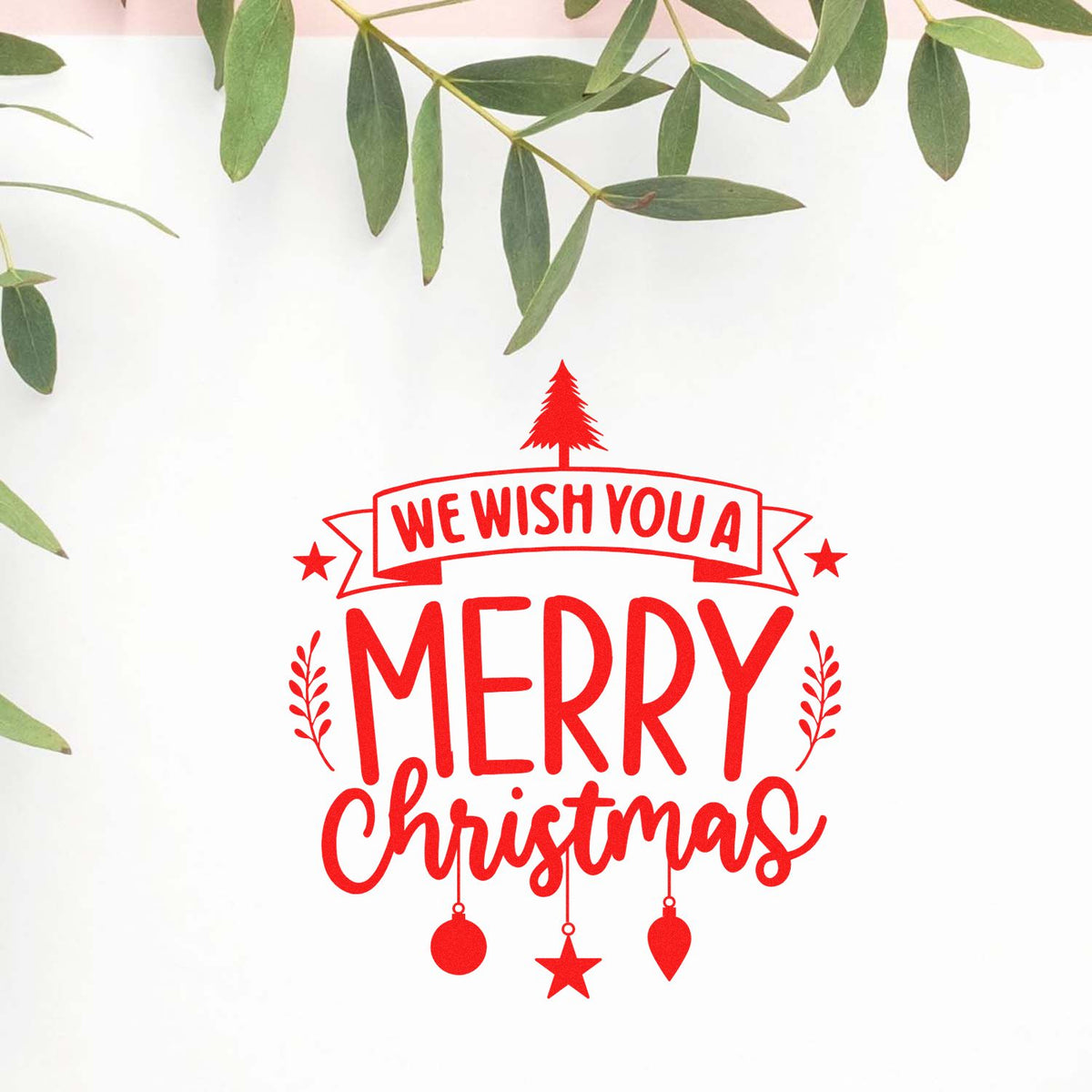 Red Merry Christmas rubber stamp design with We Wish You a Merry Christmas holiday greeting and ornament accents.
