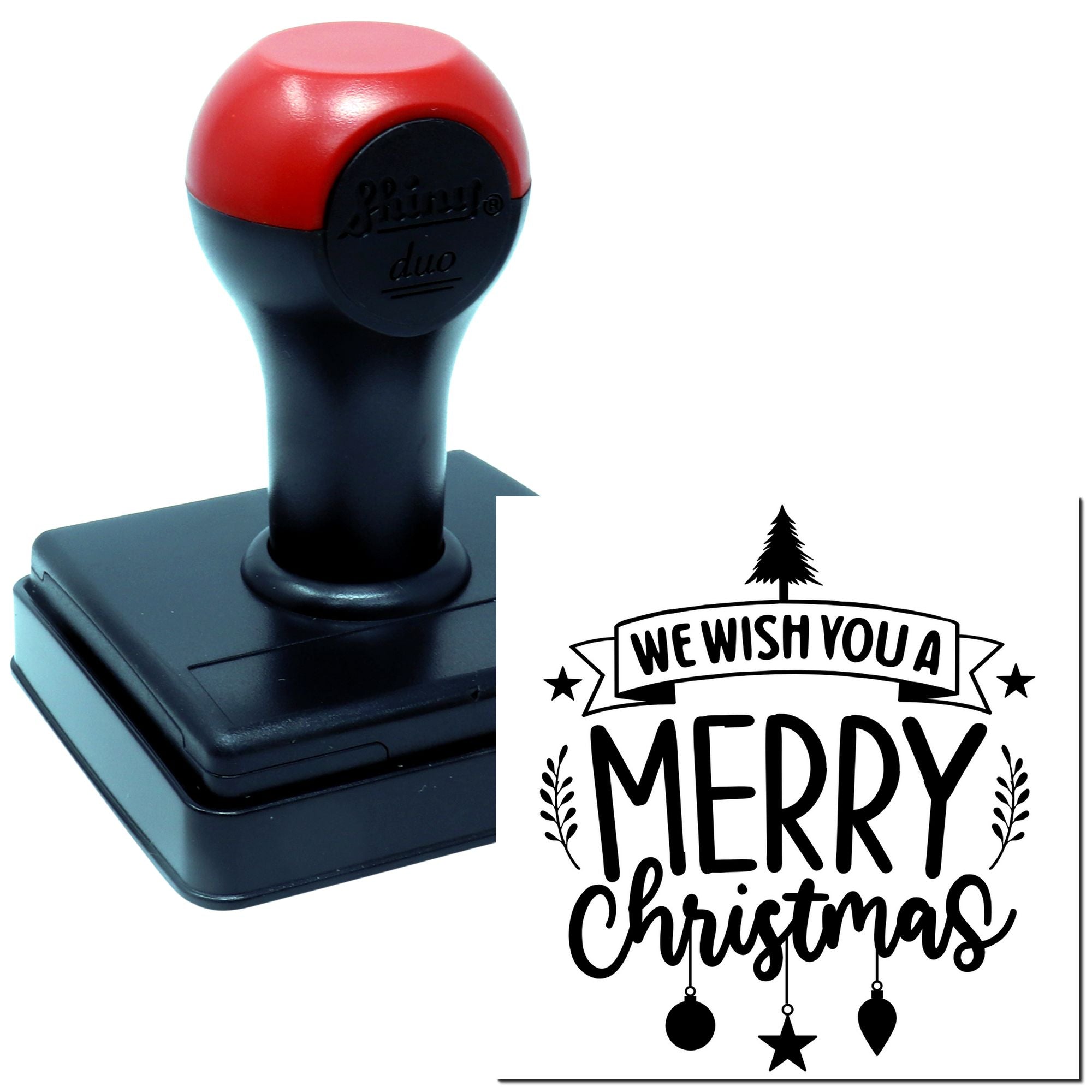 Self-inking rubber stamp with We Wish You a Merry Christmas holiday greeting design for festive card making.